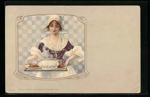 AK Junge Frau in niederländischer Tracht mit einem Tablet Essen