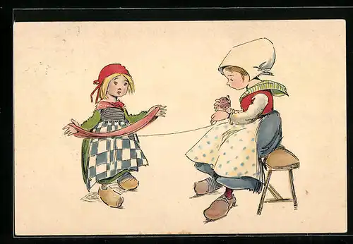 AK Zwei Mädchen in niederländischer Tracht beim Wolle aufwickeln