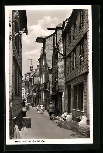 AK Monschau /Eifel, Stadtstrasse mit Geschäften