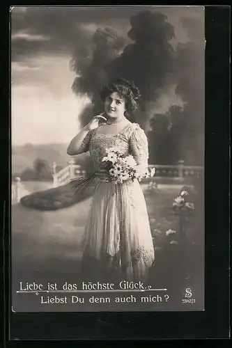 Foto-AK L.J. & F.F. Nr. 3342 /3: Hübsche Dame posiert mit einem Blumenstrauss