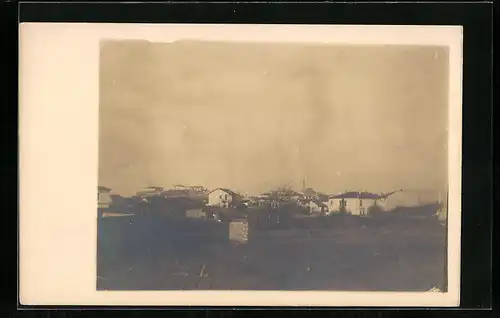 AK Üskueb, Ortsansicht mit Häusern und Minarett