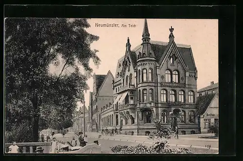 AK Neumünster, Gebäudepartie mit Buchdruckerei am Teich, Strasse