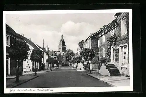 AK Nümbrecht, Strassenpartie, Blick zur Kirche