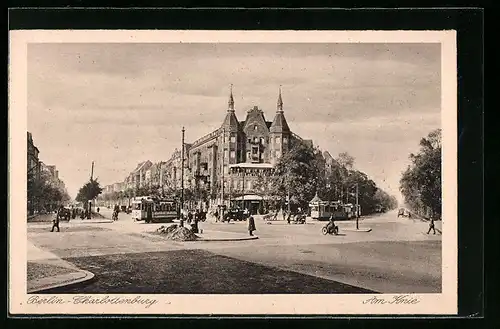 AK Berlin-Charlottenburg, Strassenpartie Am Knie mit Strassenbahn
