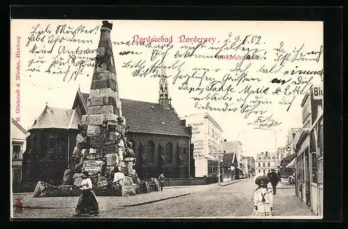 AK Norderney, Nordseebad, Friedrichstrasse mit Restaurant und Denkmal