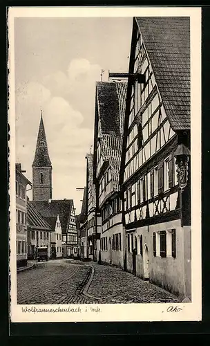 AK Wolframseschenbach i. Mfr., alte Fachwerkhäuser mit Blick zum Kirchturm