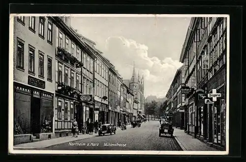 AK Northeim a. Harz, Mühlenstrasse mit Gasthaus und Geschäften