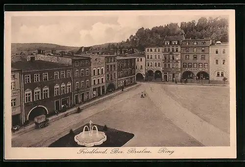 AK Friedland /Bez. Breslau, Ringstrasse mit Buchhandlung und Brunnen