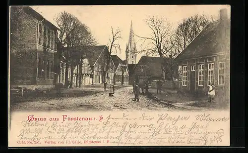 AK Fürstenau i. Hann., Strassenpartie mit Kirche