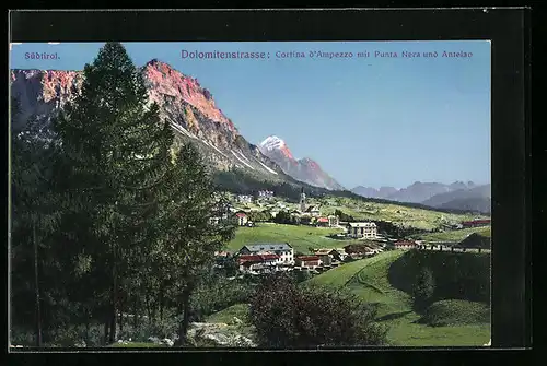 AK Cortina d`Ampezzo, Dolomitenstrasse-Ortsansicht mit Punta Nera und Antelao