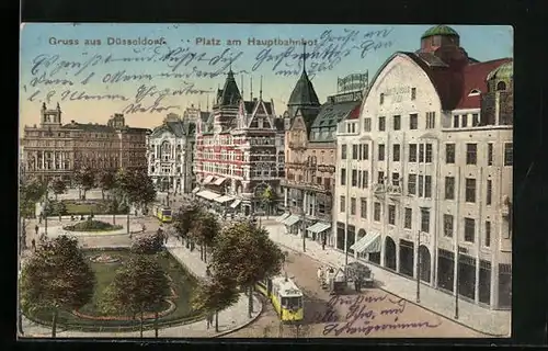 AK Düsseldorf, Platz am Hauptbahnhof mit Geschäften und Strassenbahn