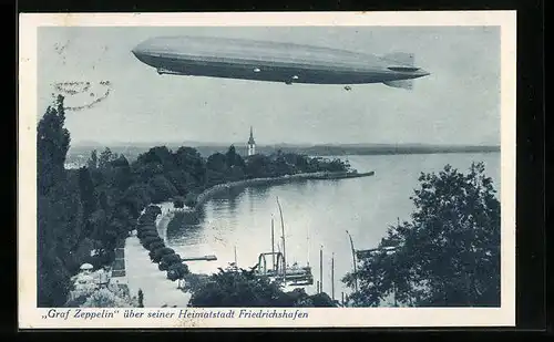 AK Friedrichshafen a. B., Luftschiff LZ 127 Graf Zeppelin über seiner Heimatstadt