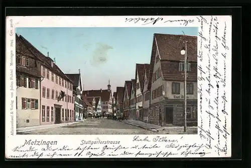 AK Metzingen, Partie in der Stuttgarterstrasse, Häuser mit leuchtenden Fenstern