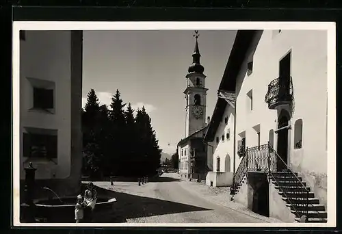 AK Bevers, Strassenpartie mit Kirche