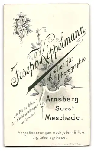 Fotografie Joseph Köppelmann, Arnsberg, kleines Mädchen im Wintermantel mit Muff und Mütze