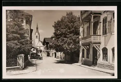 AK Igls, Hauptstrasse mit Kirche