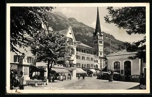 AK Bad Hofgastein, Strassenpartie mit Hotel Goldener Adler und Kirche