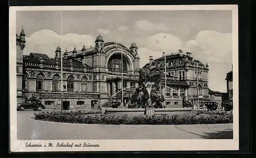 AK Schwerin i. M., Bahnhof mit Brunnen