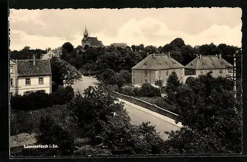 AK Lommatzsch i. Sa., Blick auf Strasse und Häuser