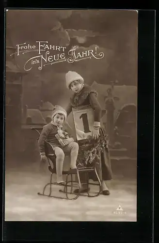 AK Frau und Junge mit einem Schlitten, Neujahrsgruss
