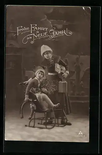 AK Junge auf Schlitten und Frau mit Paketen, Neujahrsgruss