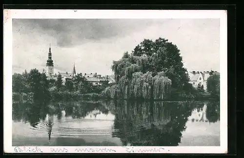 AK Littau, Blick über den See zum Ort