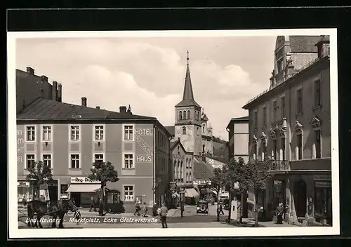 AK Bad Reinerz, Marktplatz, Ecke Glatzerstrasse, mit Kirche und Hotel Deutsches Haus