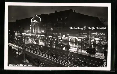 AK Berlin-Charlottenburg, Kurfürstendamm bei Nacht, mit Haus Wien und Reklame Scharlachberg