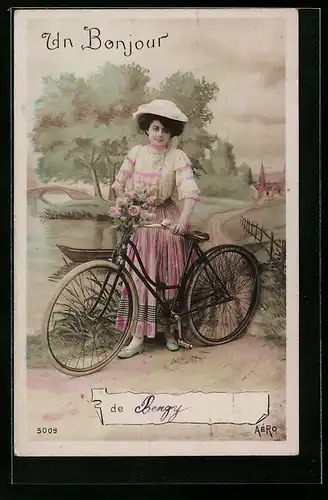 AK Dame im Kleid mit rosa Akzenten und Fahrrad