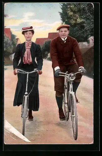 AK Dame und Herr beim Fahrrad fahren