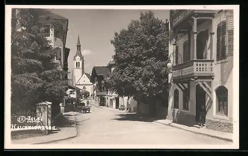 AK Igls, Hauptstrasse mit Kirche