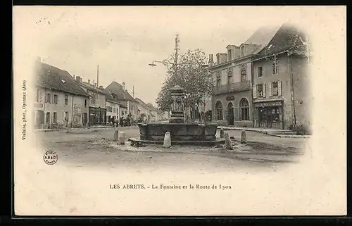AK Les Abrets, La Fontaine et la Route de Lyon