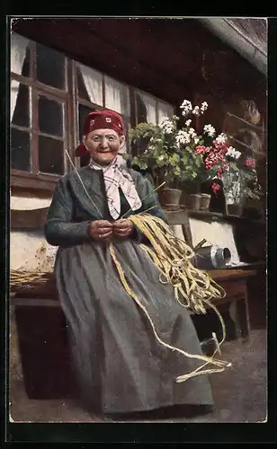 AK Frau in Schwarzwälder Tracht beim Korbflechten