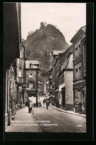 AK Oberstein a. d. Nahe, Hauptstrasse mit Blick Schlossruine und Felsenkirche