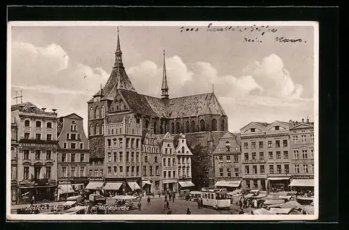 AK Rostock i. M., Strassenbahn am Markt m. Marienkirche