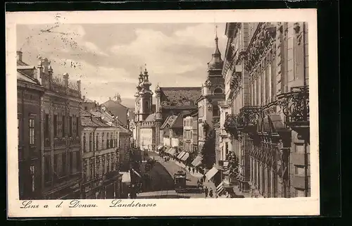 AK Linz a. d. Donau, Landstrasse mit Strassenbahn