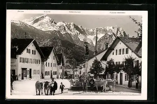 AK Garmisch-Partenkirchen, Floriansplatz gegen die Zugspitzgruppe