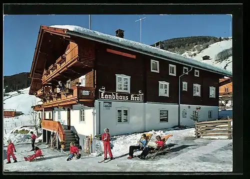 AK Gerlos, Landhaus mit Kröll im Winter mit Skifahrern