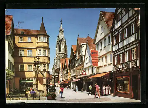 AK Reutlingen, Strassenpartie mit Geschäften, Kirche