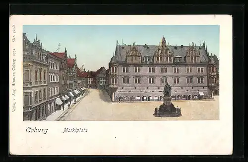 Goldfenster-AK Coburg, Marktplatz mit Denkmal und Geschäften mit leuchtenden Fenstern