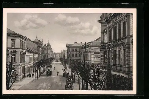 AK Troppau, Olmützerstrasse mit Strassenbahn