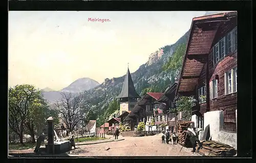AK Meiringen, Strassenpartie mit Brunnen und Kirche