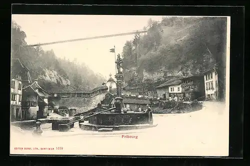 AK Fribourg, Strassenpartie mit Brunnen