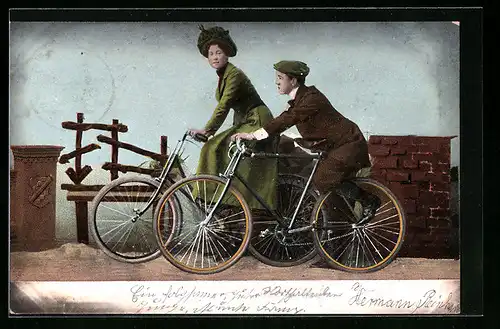 AK Dame und Herr auf Fahrrädern