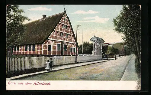 AK Jork /Altes Land, Strassenpartie mit Reetdachhaus