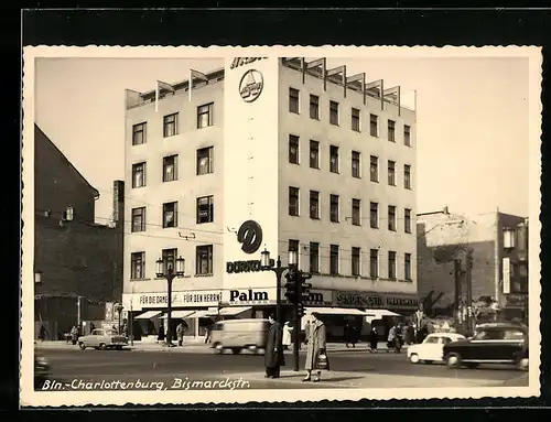 AK Berlin-Charlottenburg, Bismarckstrasse mit Geschäftshaus, Palm