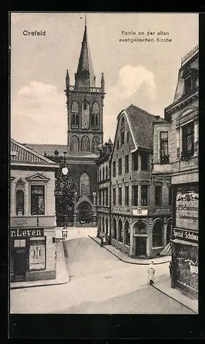 AK Crefeld, Strassenpartie mit alter ev. Kirche aus der Vogelschau