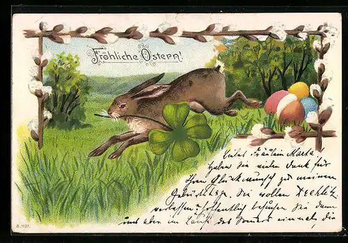 AK Osterhase rennt mit Kleeblatt über die Wiese