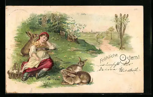 Künstler-AK Dame neben Osterhasen am Wegesrand