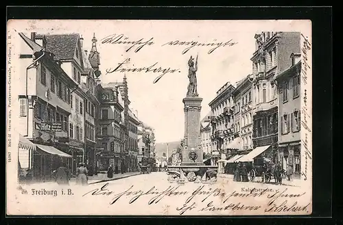 AK Freiburg i. B., Kaiserstrasse mit Geschäft und Brunnen